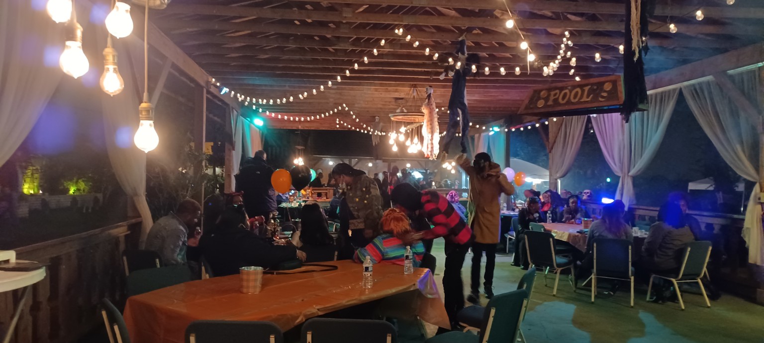 Covered garden event space at night